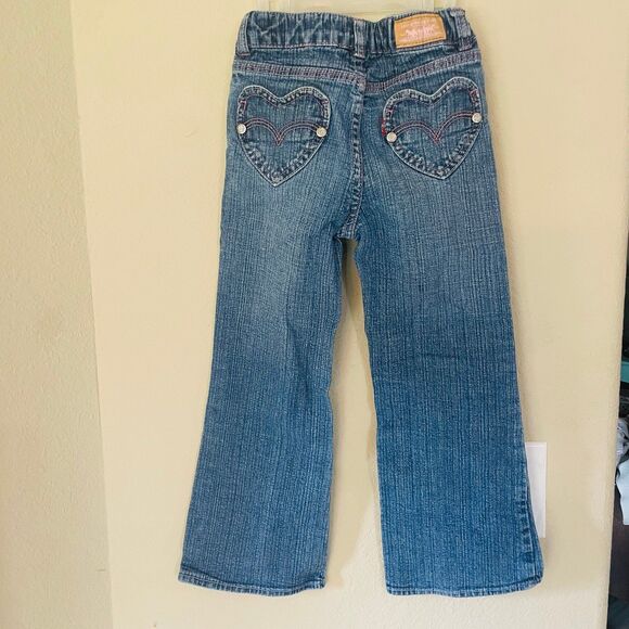 Levi's girls jeans with pink sewing and glitter buttons heart pockets size 5 - Picture 1 of 5